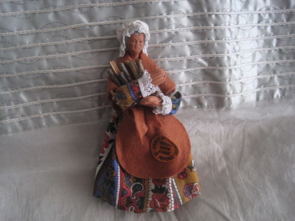 VINTAGE SANTON YOLANDE CLAY OLDER WOMAN HOLDING LUMBERJACK/WOO​DFIRE