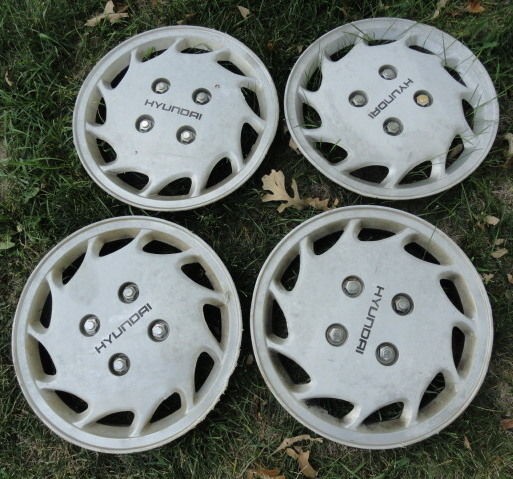 Hyundai Excel 2 door Hatch HUB CAPS 1990, 1991   set of 4   13 inch