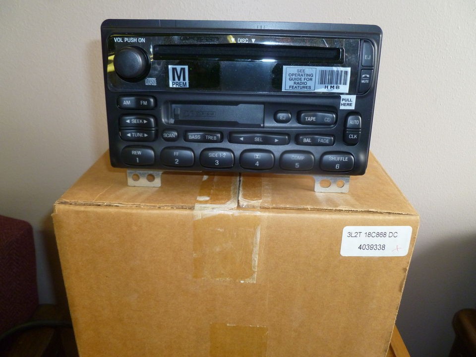 3L2T 18C868 DC FORD FACTORY AM FM CASSETTE CD PLAYER MINIVAN (NEW)