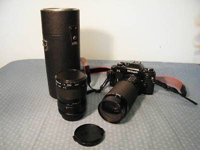 VINTAGE NIKON FG 35MM CAMERA WITH 2 LENSES    NICE