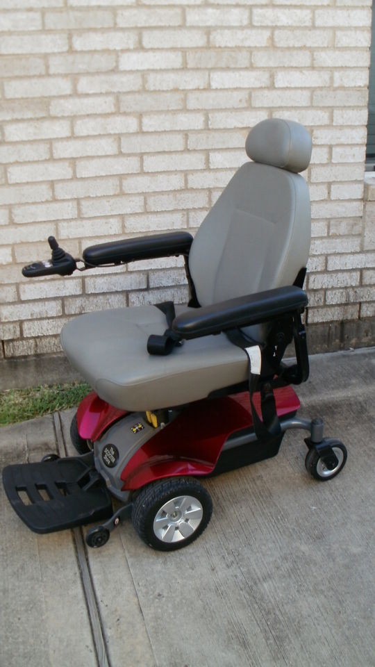 SCOOTER STORE TSS 300 WHEELCHAIR WITH NEW BATTERIES.