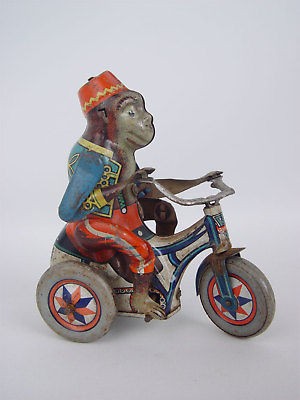 Rare Arnold Germany Bobby Monkey Cyclist Tin Toy Windup