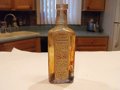   SMITHS LINIMENT BOTTLE S.S. DRUG CO. CARDINGTON, OHIO HUMAN & HORSES