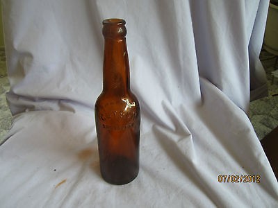 ANTIQUE GUTSCH SHEBOYGAN AMBER BEER BOTTLE CONTENTS 12 FL. OZ.