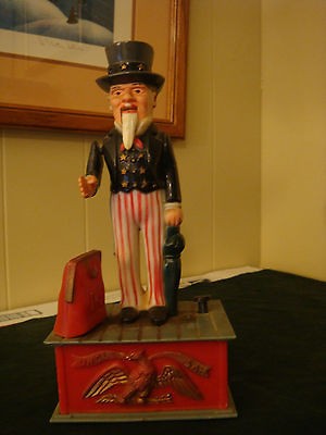 Actual Vintage Uncle Sam mechanical bank . plastic and working