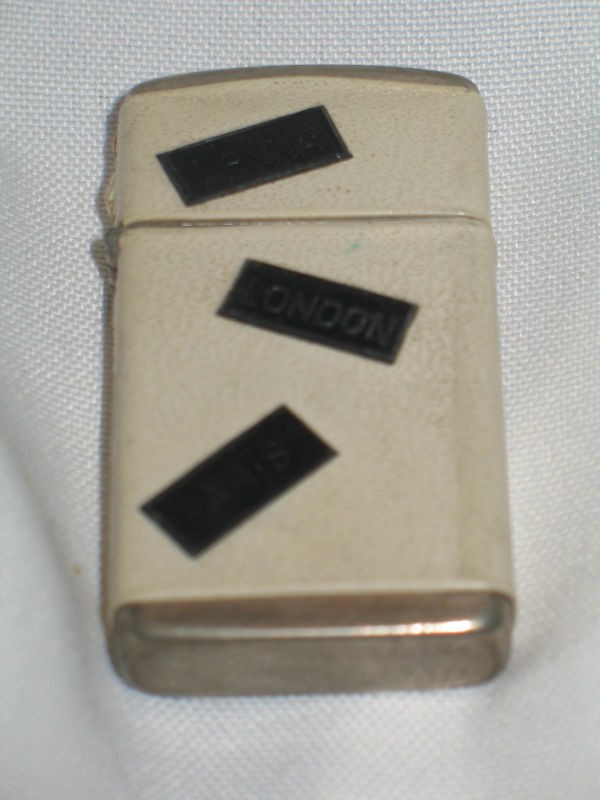 vintage trimlite champ lighter austria  24 99