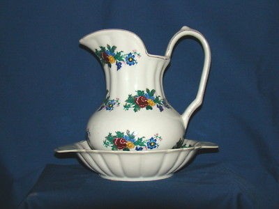 Porcelain Pitcher and Bowl set trimmed in Gold with Floral Design