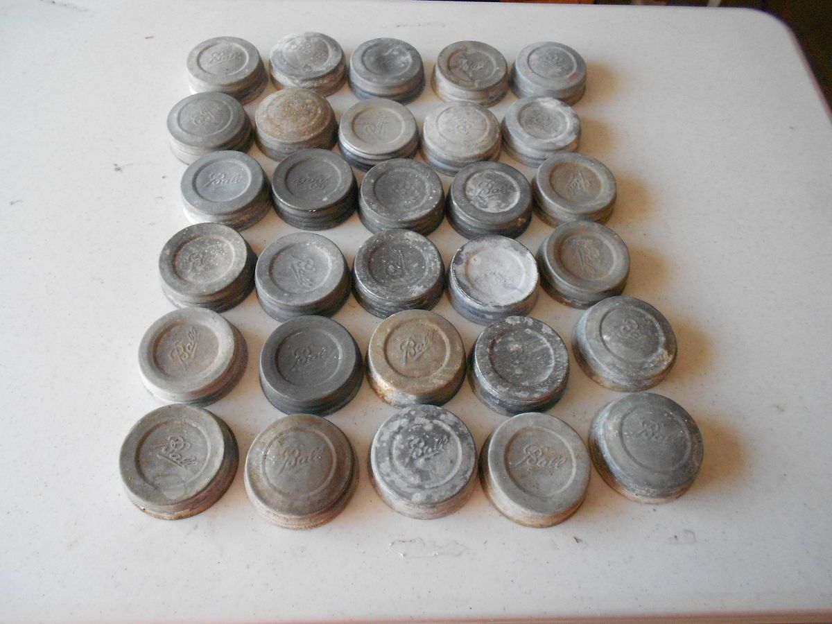   of 30 Vintage Zinc Mason Jar Lids White Porcelain Lined Ball