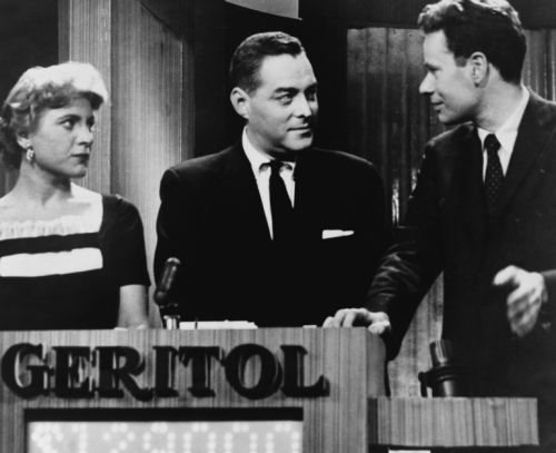  Quiz show 21 host Jack Barry turns toward contestant Charles Van 