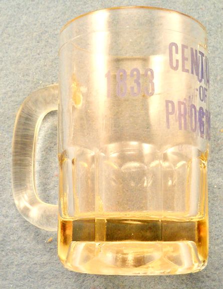 1833 1933 GLASS MUG with blue Century of Progress inscription.