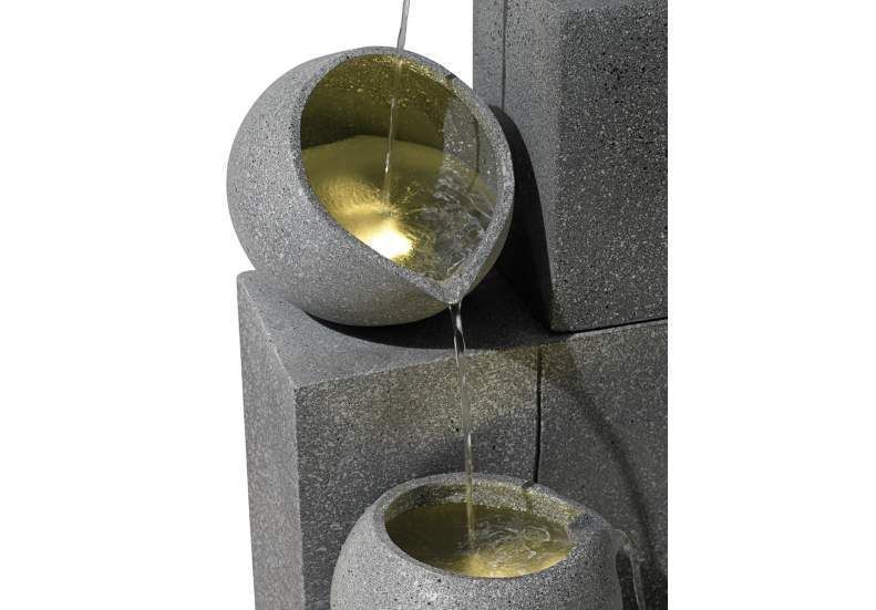   the beauty of falling water in this modern fountain design