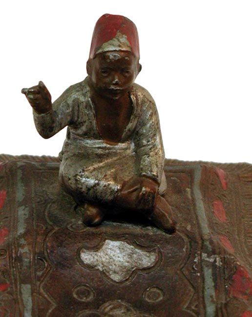   Made Turk Motif Polychrome Spelter Flying Carpet Motif Figurine