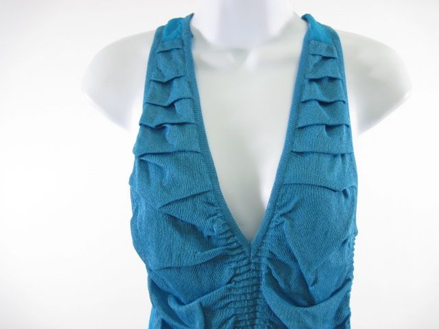 you are bidding on a carlos miele blue sleeveless top shirt in a size 