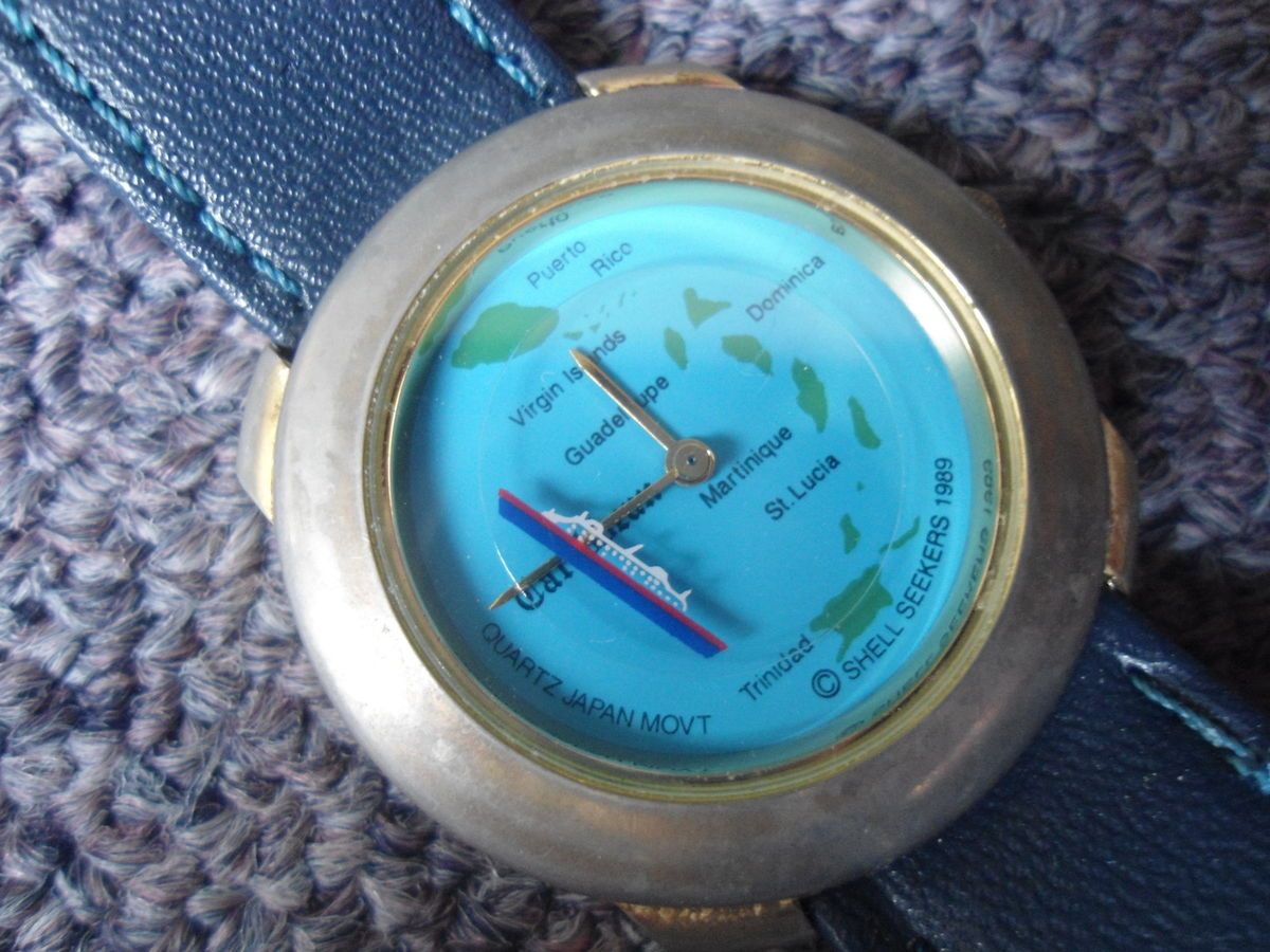 1989 SHELL SEEKER WATCH QUARTZ JAPAN MOVT PUERTO RICO ST LUCIA MENS OR