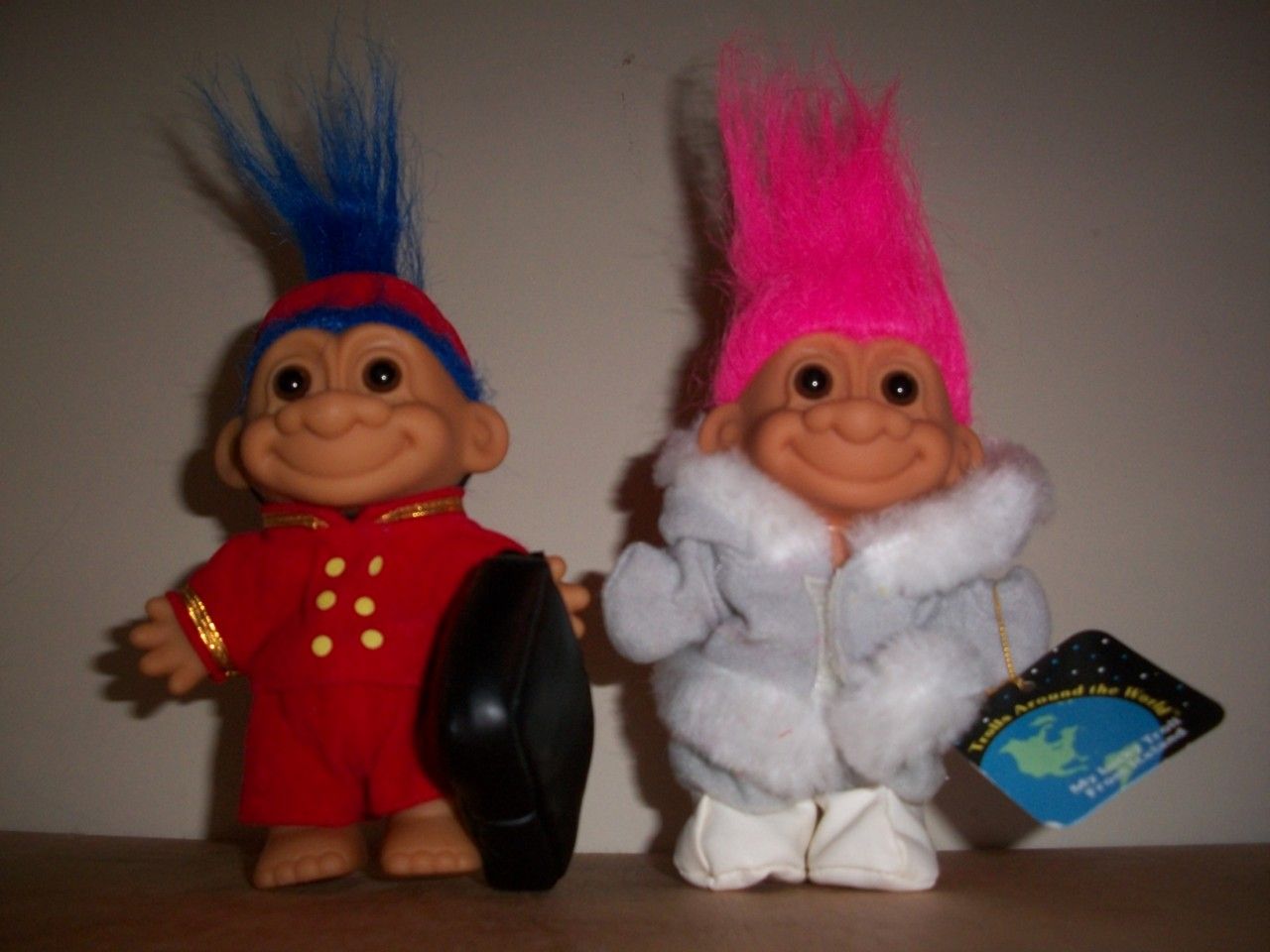  . BOTH TROLLS ARE APPROX. 4 1/2 TALL, NOT INCLUDING THEIR HAIR