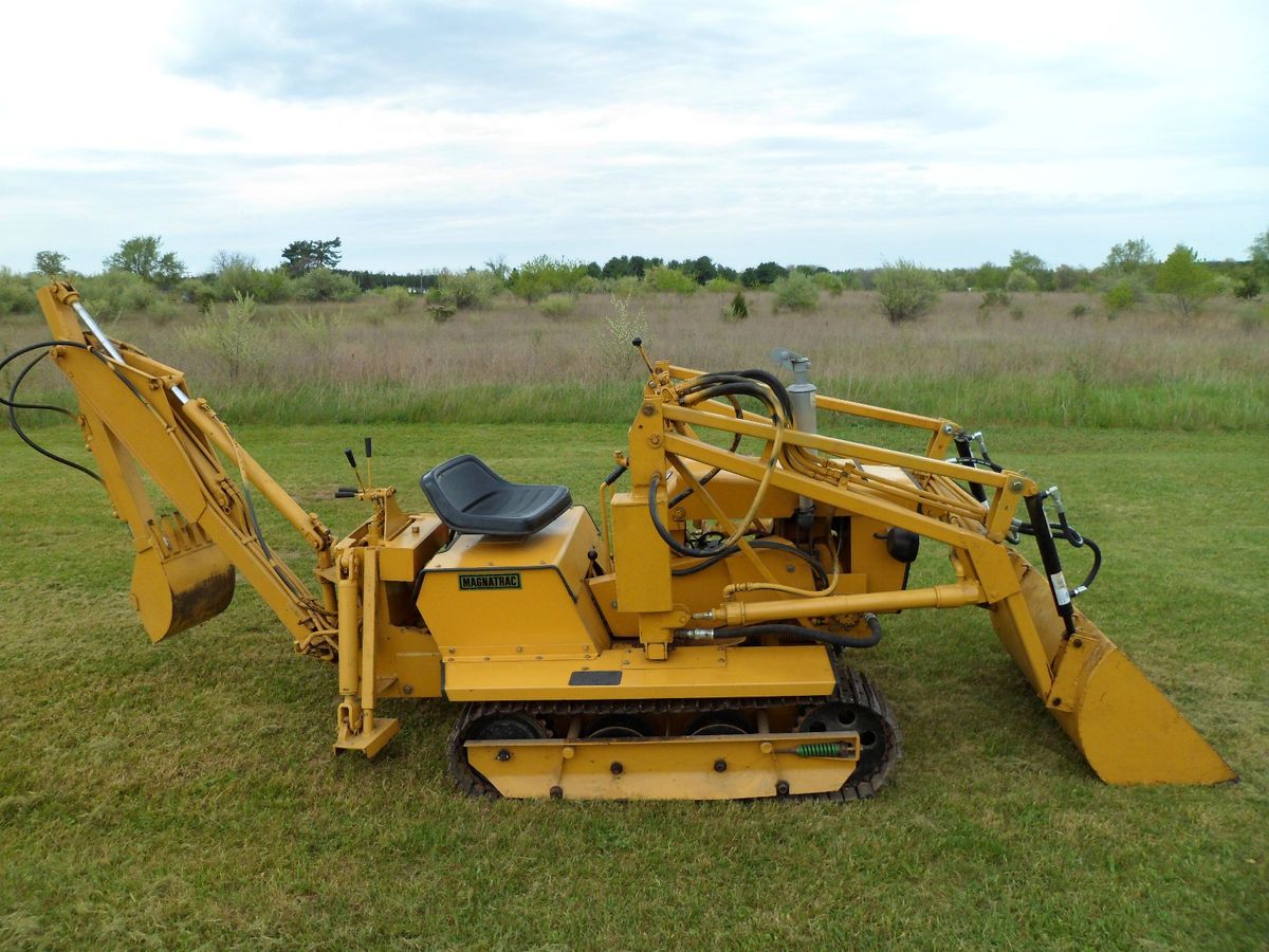 Magnatrac Model MT2000 Mini Dozer with Loader and Backhoe