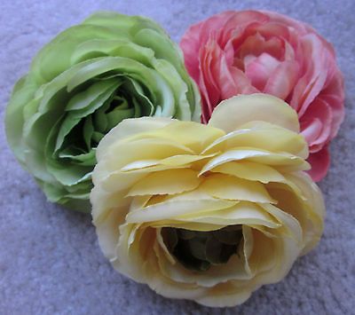 Silk ranunculus flowers   green, peach, and yellow