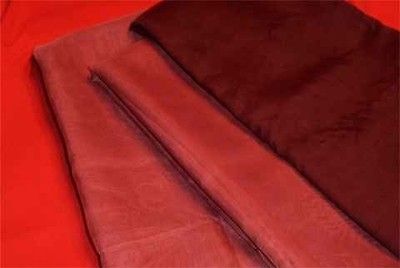 PAIR OF CRANBERRY RED SHEER VOILE CURTAINS 120W X 63 L