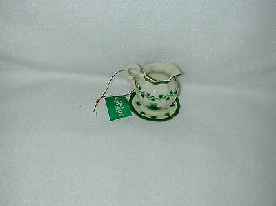 CHRISTMAS IRISH TEAPOT/SAUCER W/GOLD/GREEN TRIM AT TOP/EDGE OF SAUCER