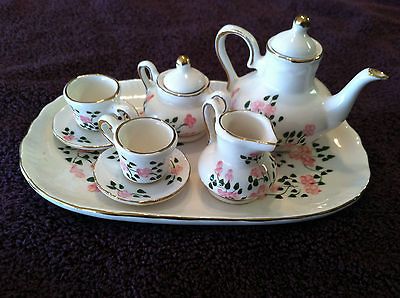 Miniature China Tea Set with Pink Floral Motif and Gold Trim 8 Pieces